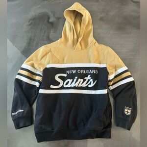 Mitchell & Ness New Orleans Saints black and gold hoodie

Youth XL